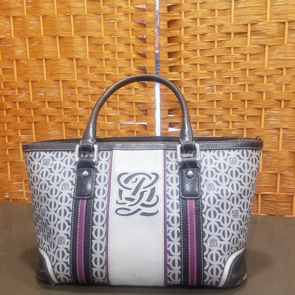 LOUIS QUATORZE PARIS SIGNATURE HANDBAG.